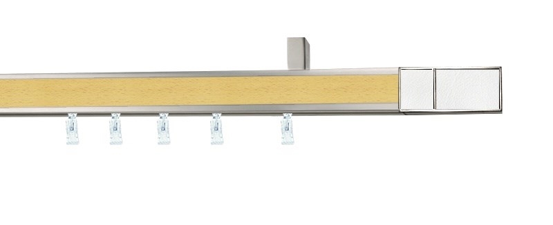 Kombinovaná garnýž Aveno Croco v bílo-bukovém provedení. Jednořadý profil 31×13 mm. Montáž na stěnu nebo strop.