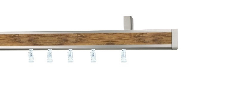 Jednořadá garnýž Aveno Malibu, dekor dub. Hliníkový profil 31x13 mm, umožňuje montáž na stěnu nebo strop.